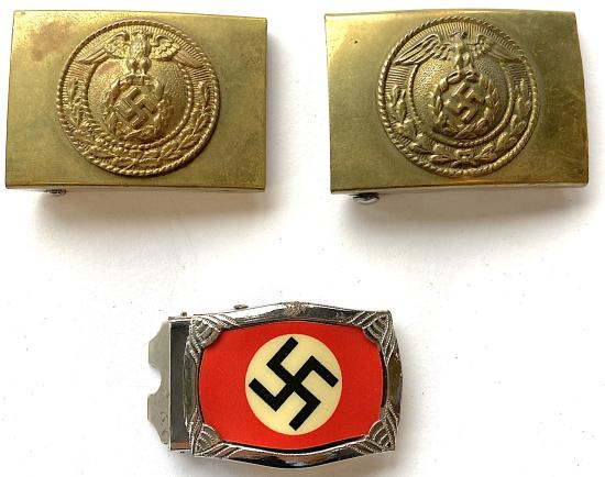 WW2 THREE SA CHILD SIZED BELT BUCKLES IN BRASS AND A SMALL HJ BUCKLE