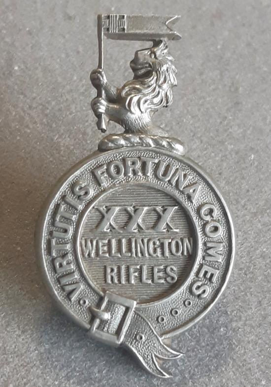 CANADIAN XXX Wellington Rifles Silver Plated Collar Badge.