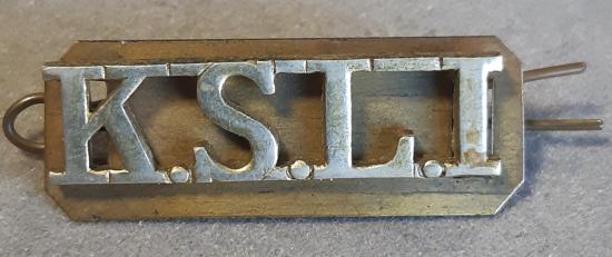 BRITISH Shoulder Title “K.S.L.I.”– White Metal