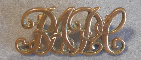 BRITISH Shoulder Title “RAPC” (Royal Army Pay Corps) - Gilding Metal