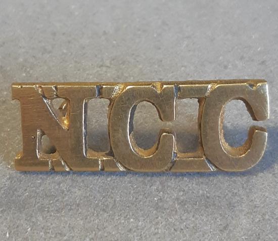 BRITISH Shoulder Title “N.C.C” (Non-Combatant Corps) – Field Cast Brass