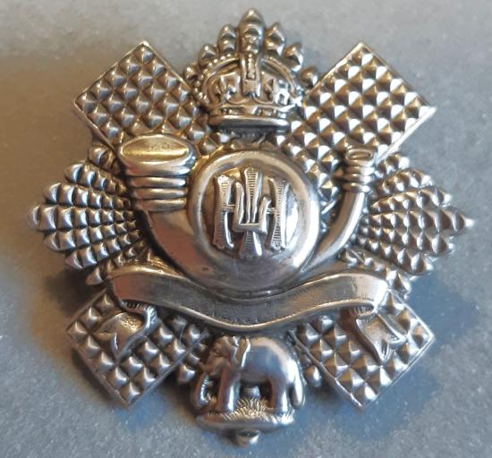 BRITISH - Highland Light Infantry White Metal Hat Badge (Blank Wide Scroll)- Territorial Bns.