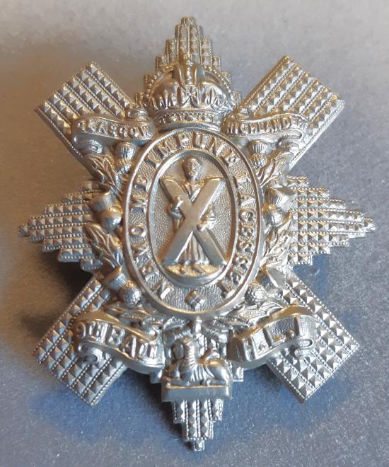 BRITISH - Glasgow Highlanders 9th Bn. Highland Light Infantry White Metal Hat Badge