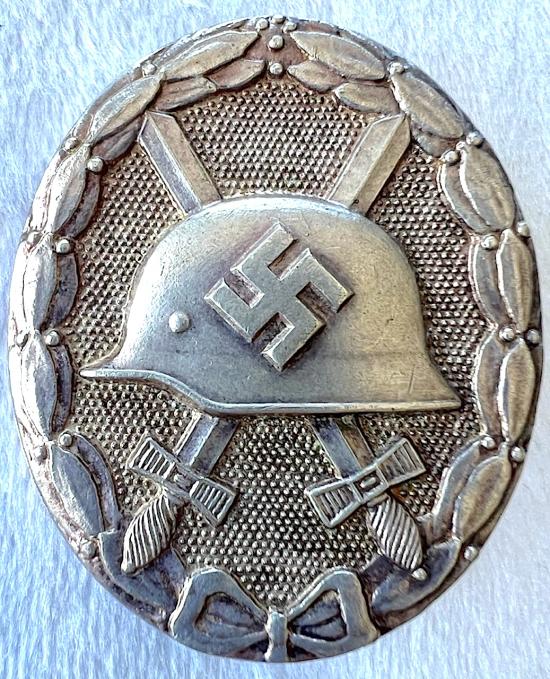 POST WW2 PRODUCED GERMAN SILVER WOUND BADGE  - MARKED L/14