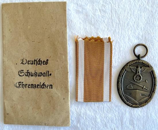 WW2 GERMAN WEST WALL MEDAL AND PACKET - UNISSUED