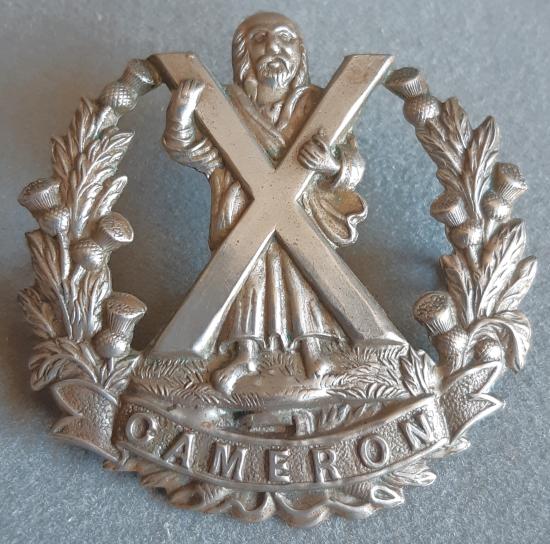 BRITISH - The Queen's Own Cameron Highlanders White Metal Badge (KK688)