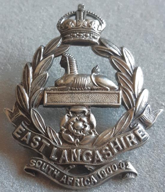 BRITISH - The East Lancashire Regiment (4th/5th Battalions) White Metal Hat Badge (KK1721)