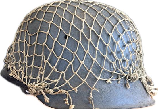 WW2 GERMAN NETTED M42 HELMET WITH CONNECTIONS TO CHANNEL ISLANDS